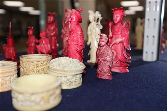 A group of Chinese ivory chess pieces and Canton ivory containers, 19th century